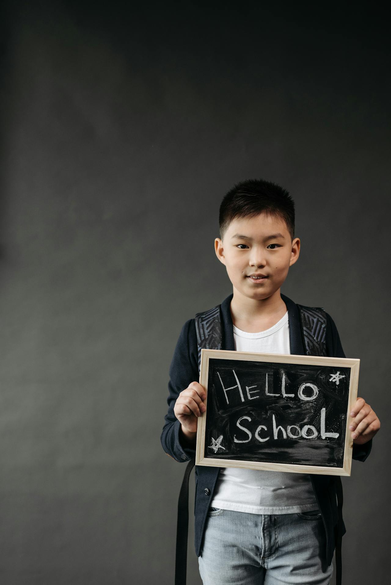 Kid w/ Hello School Sign